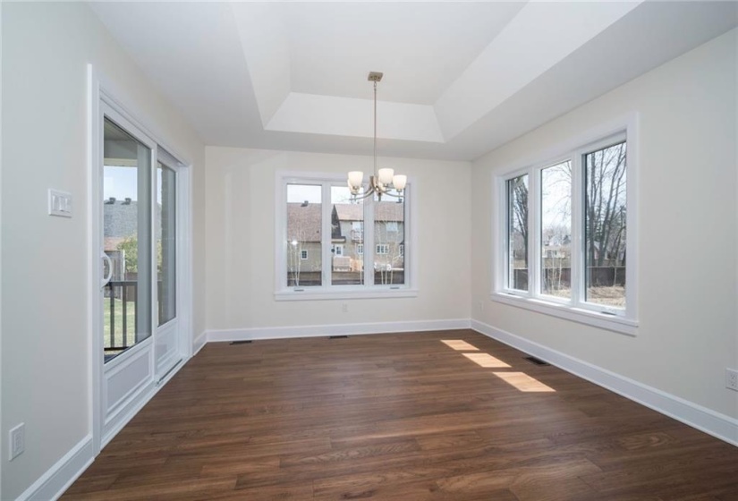 Dining area with patio doors to the covered rear patio