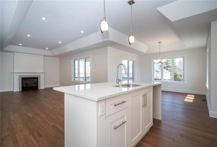 View from kitchen overlooking the open concept main living area