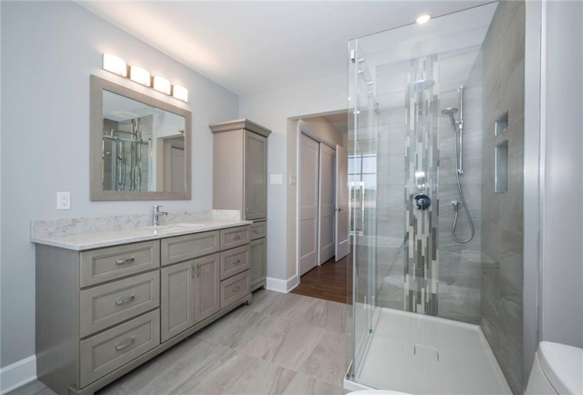 Beautifully finished ensuite bath with separate shower plus a soaker tub