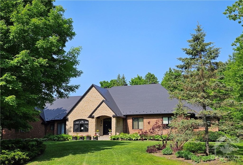Experience the epitome of luxury living in this stunning custom built Bungalow, nestled on a tranquil and private, beautifully landscaped 2.07-acre lot in the prestigious Rideau Forest, Manotick neighbourhood. Every detail of this meticulously crafted home is designed to impress and built with the highest quality construction and materials used, this is evident throughout.