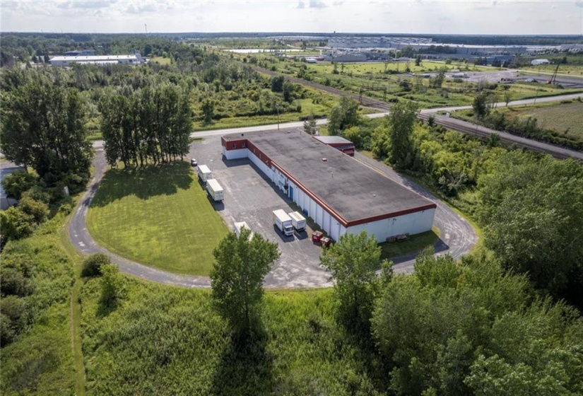 Aeria view if the property from the east that shows the 5 acres site and building location. that fronts on Boundary Rd