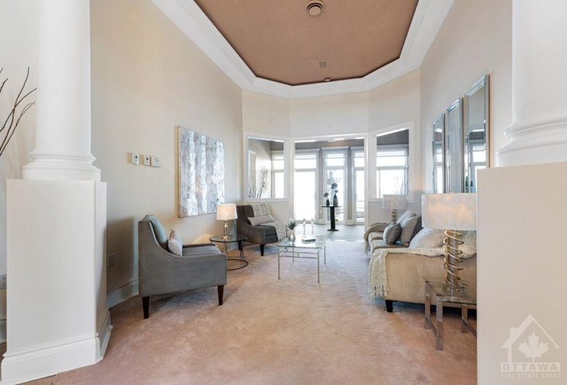Elegant living room with showcase drop ceiling