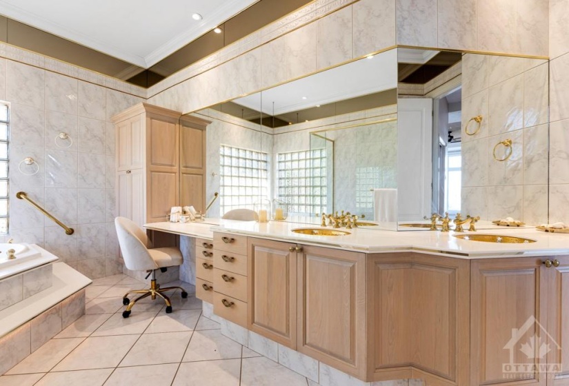 Ensuite with 2-sink vanity, soaker tub and glass shower