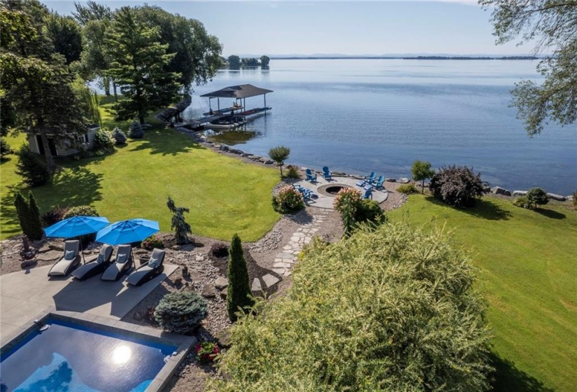 Heated Inground Pool, fire pit, Boat Slip, Lake St Francis, Shipping Channel, and view of Adirondack Mountains in the distance