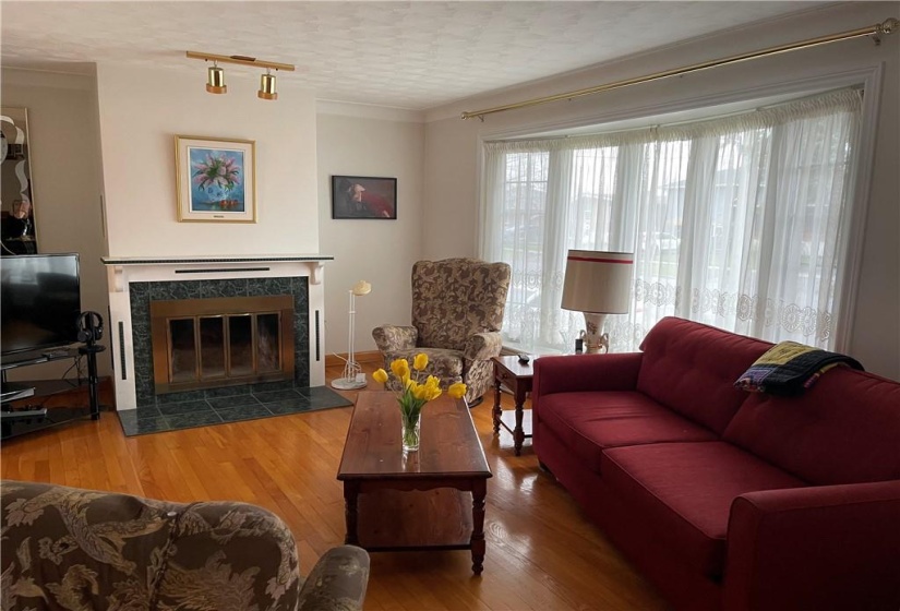 Living room - bay window & hardwood floors