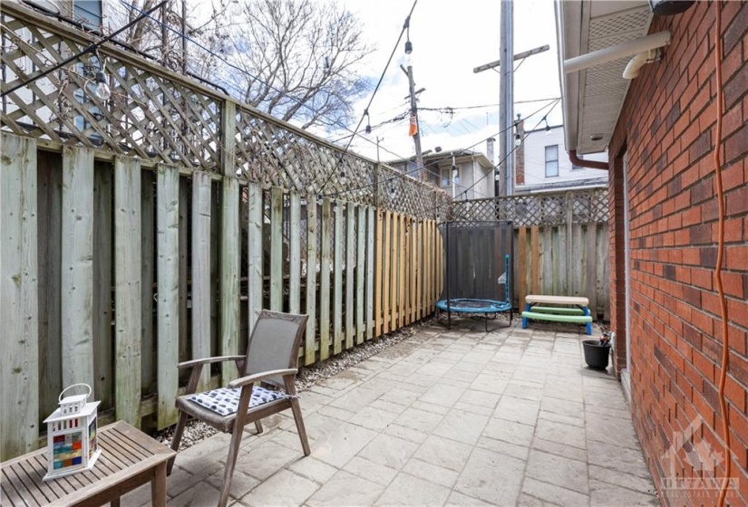 Wonderful fully fenced backyard with interlock patio.