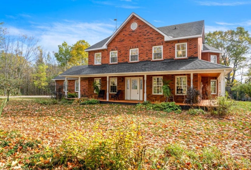 Natural 144 acre setting for this gracious brick 4 bed, 2.5 bath home