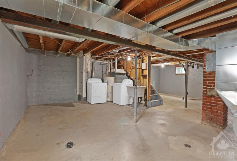 Large basement with rough in & side entrance door