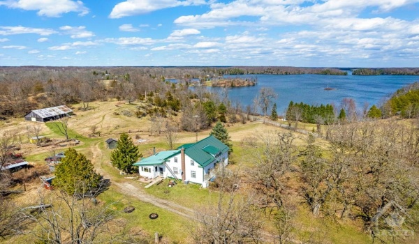 Century home with 275 acres in Green Bay on Bobs Lake