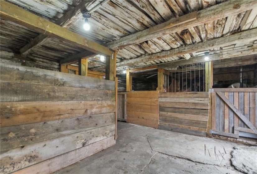 Log barn with 6 box stalls perfect for small livestock or a kennel
