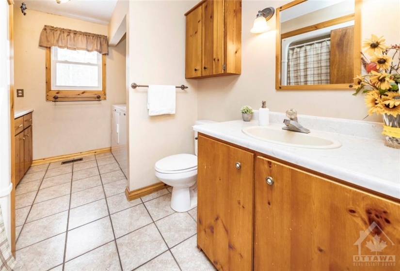 The bathroom is huge and offers loads of storage.