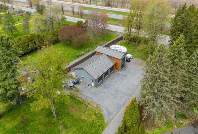 Aerial view of the detached 4 car garage /workshop with additional onsite parking.