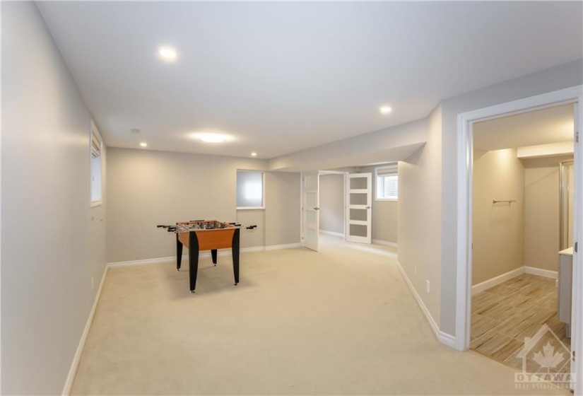 fully finished basement serves as an executive suite with oversized windows