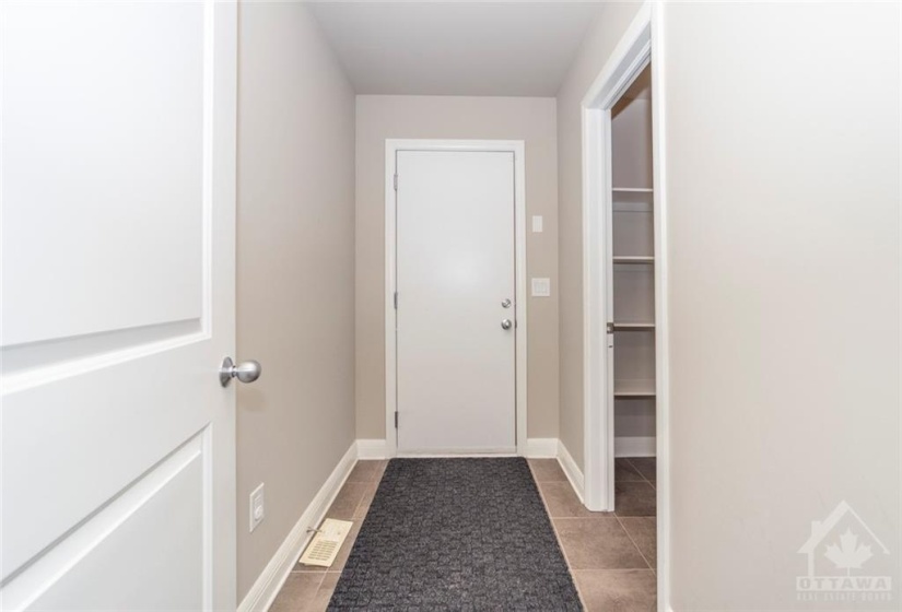 The mud room leads to the 2 car garage as well as the walk-in pantry that could easily be transformed into a walk-in closet