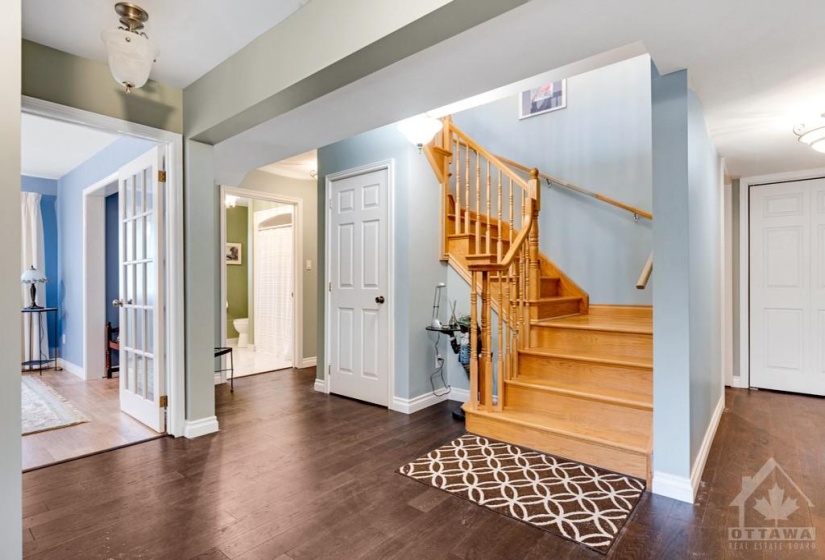 Oak staircase to living-dining, kitchen and two more bedrooms