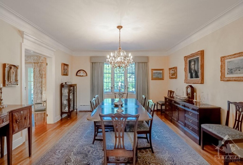 Formal dining room with backyard access.