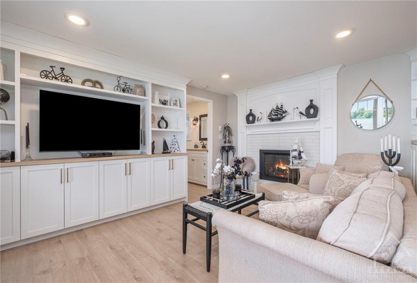 Living room with gas fireplace.