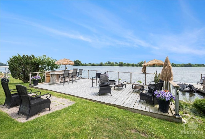 Deck overlooking the sandy, gradual beach