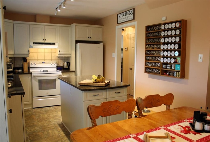 Kitchen with granite counters and plenty of cupbourds