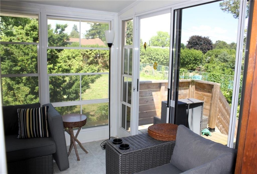 Sunroom leads to deck with BBQ gas hookup