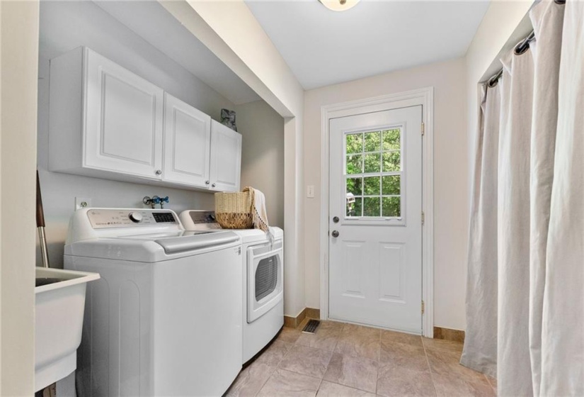 Main floor laundry with back yard access.