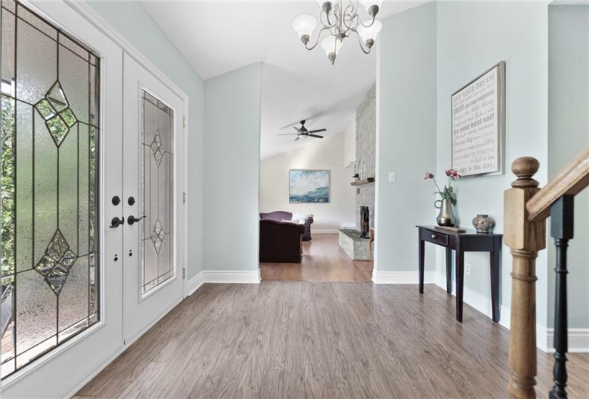 Welcome home. Cathedral ceilings in foyer and living room.