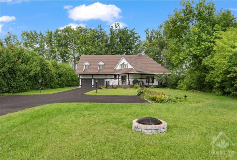 front of the house near the road