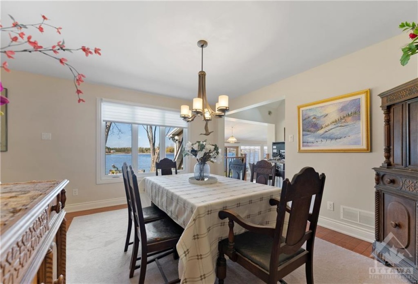 Gorgeous views from this spacious dining room.  This is a gorgeous extremely large dining room set and look at the space.