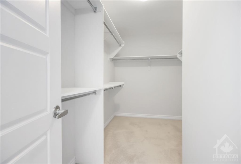 Primary walk-in closet