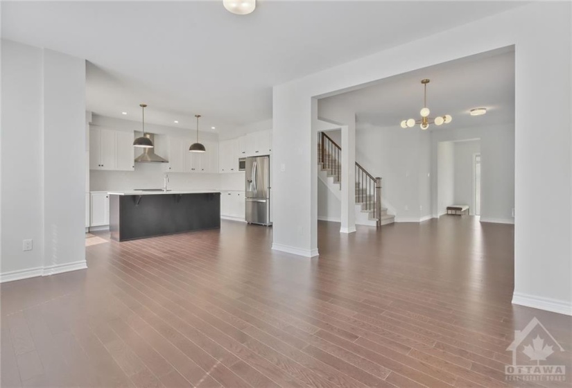 View from family room towards kitchen and dining room