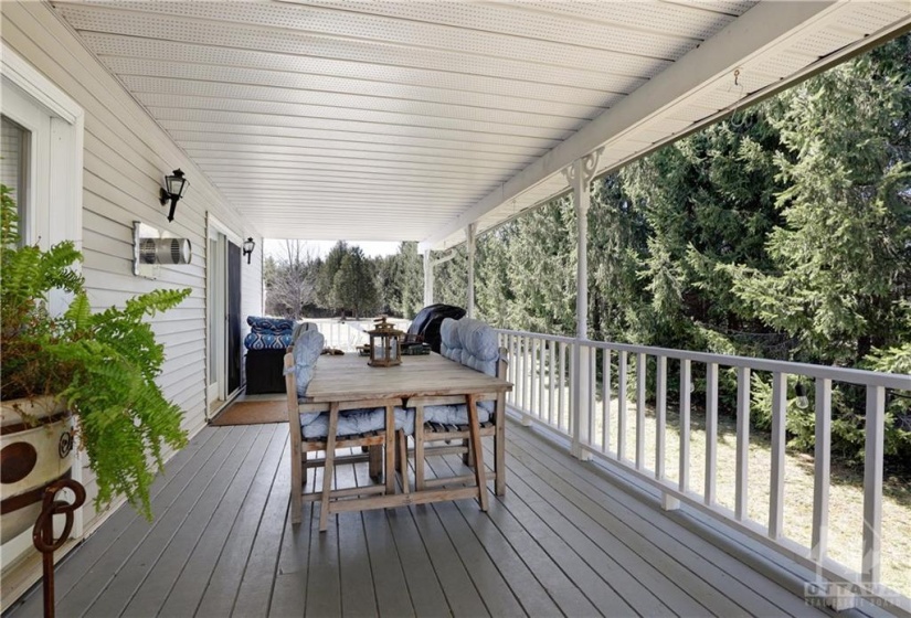 Beautiful back deck with access to both living and dining room.