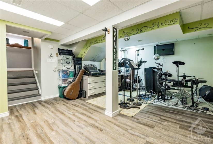 Basement Rec room with a large laundry room and another storage area with cold storage