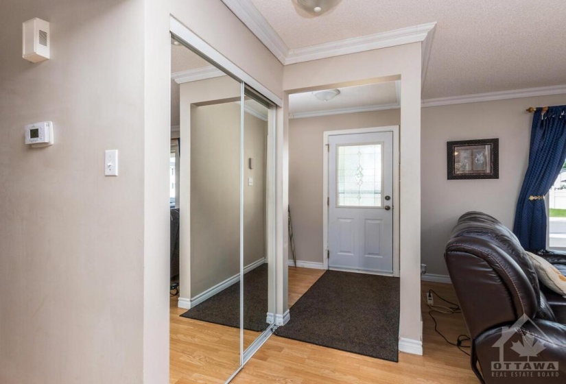 Foyer with Living Room on the right