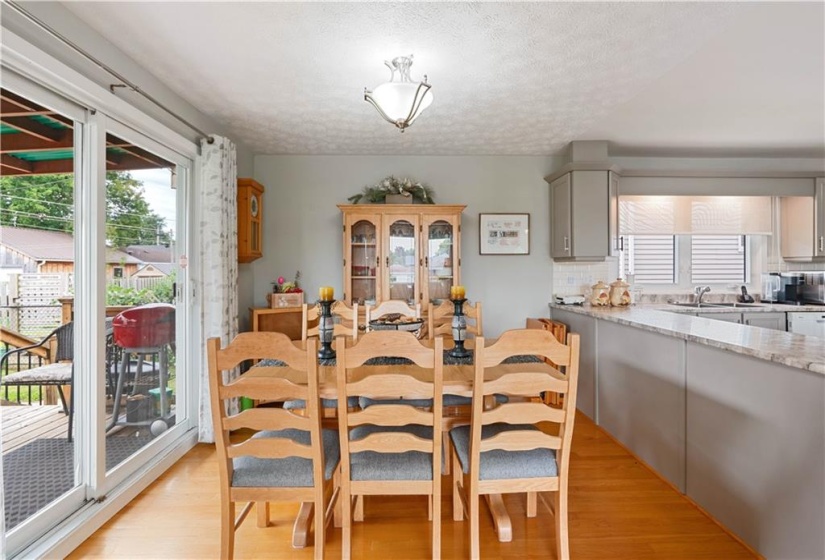 Dining area with patio doors to the covered deck.