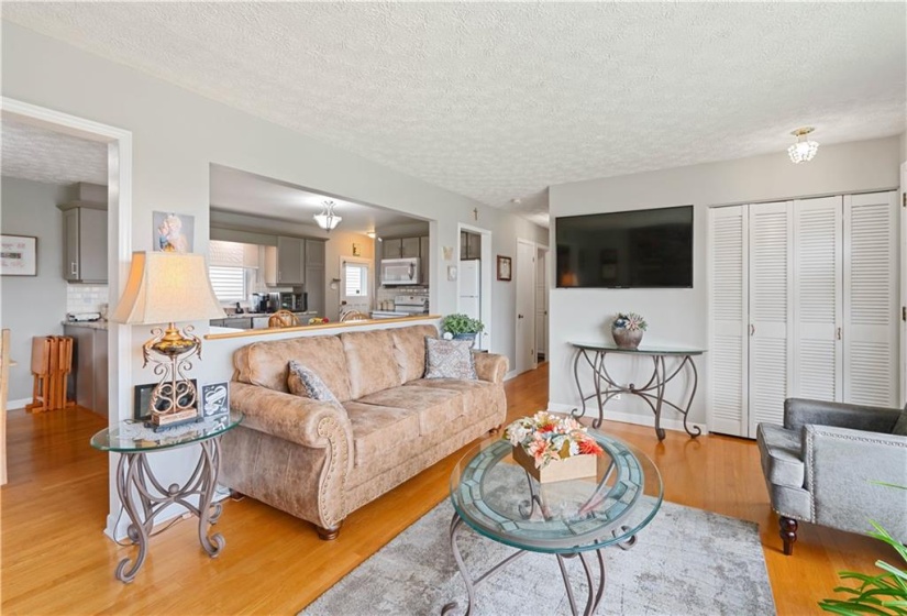 Beautifully finished hardwood floors in the living room and dining area.