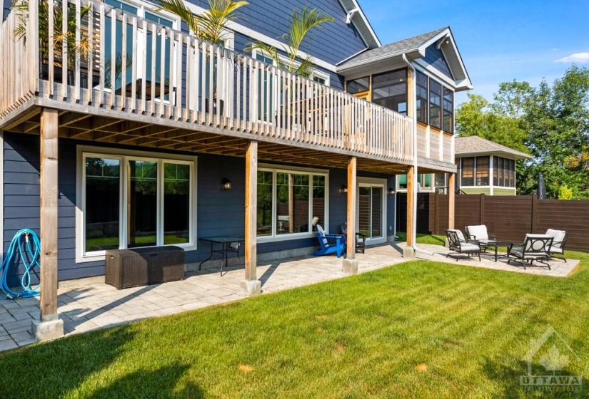 Enjoy outdoor living on upper deck or lower patio