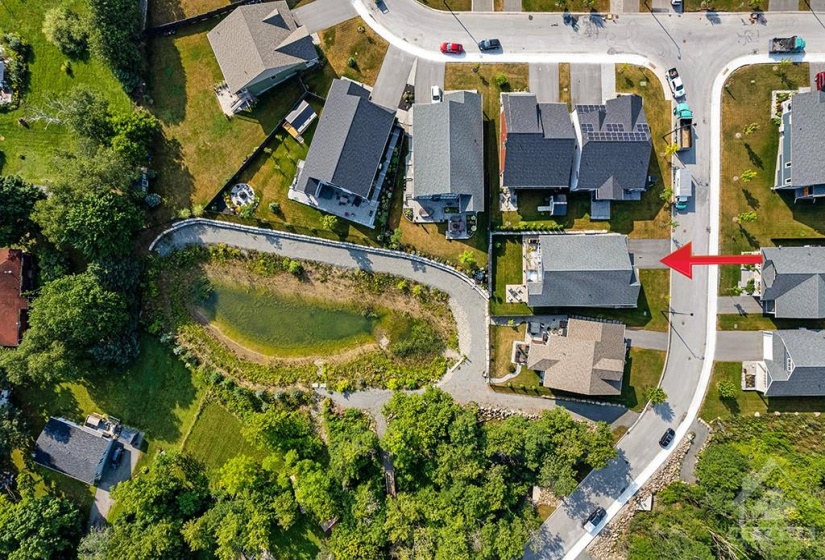 Home backs onto green space with walkway.