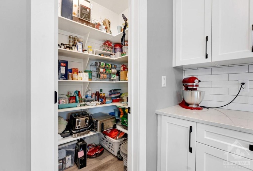 Kitchen has walk-in pantry