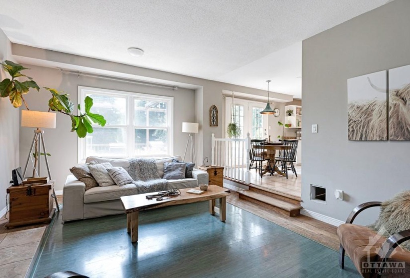 Living room open to dining area and kitchen