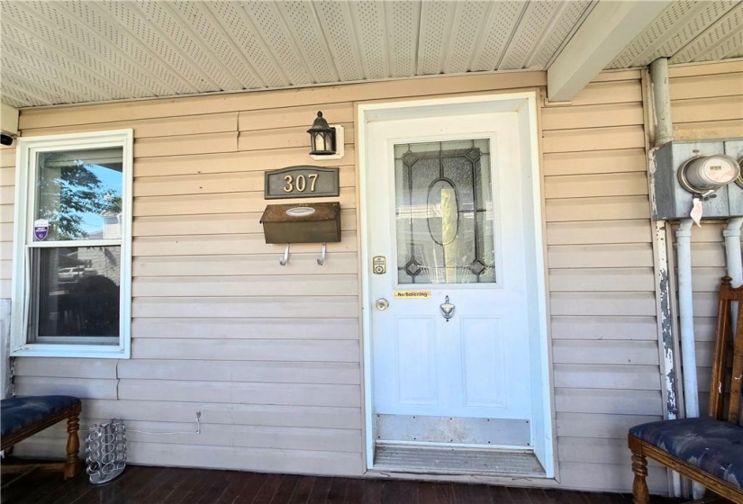 Front door to the vacant unit.