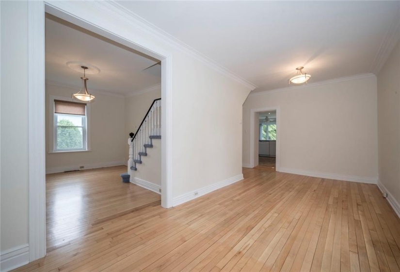 Living room showing the Large front entry with staircase for 2nd level