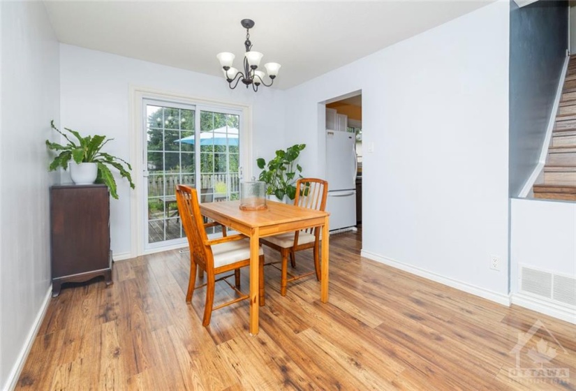 Dining area overlooking your fenced backyard!