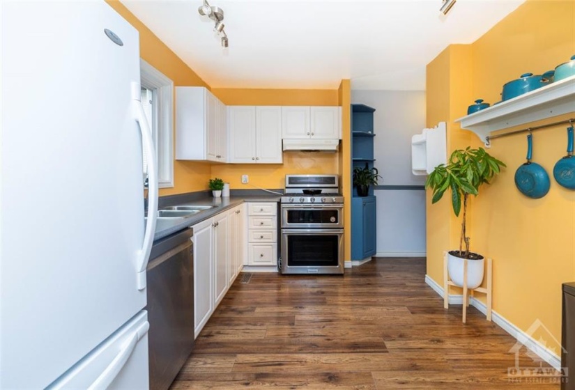 Spacious kitchen with sink overlooking the backyard!