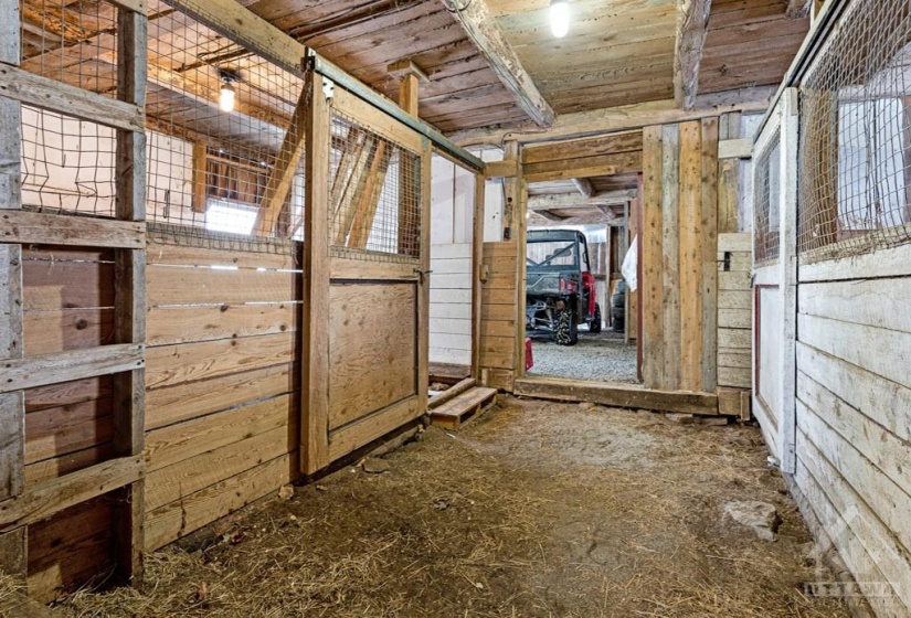 This big barn has 6 horse stalls and 11' ceiling