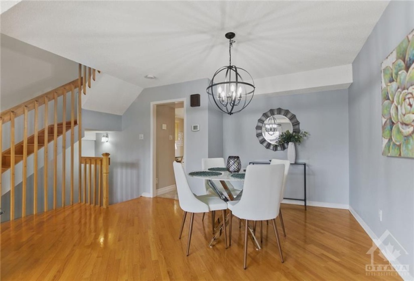 Hardwood graces all 3 levels, including wood staircases.