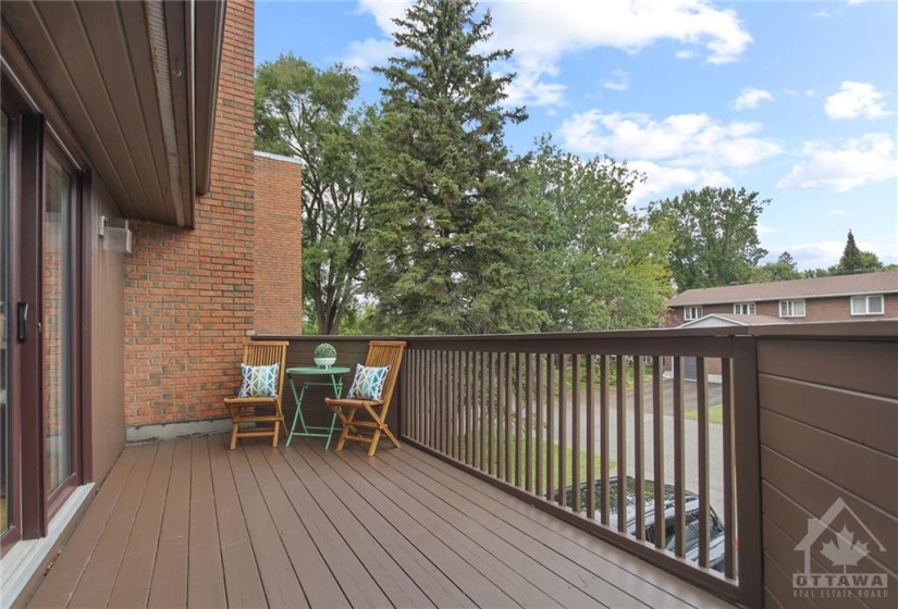 Front balcony, with freshly stained wood. Deck replaced 2014.