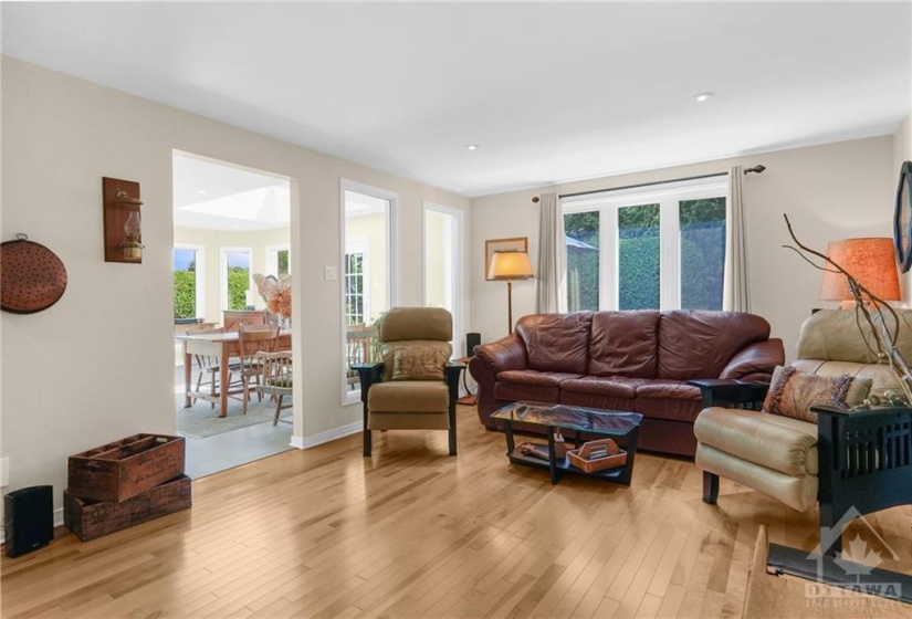 Huge Family room open to the Kitchen with gleaming foxwood birch, hardwood flooring installed in 2012.