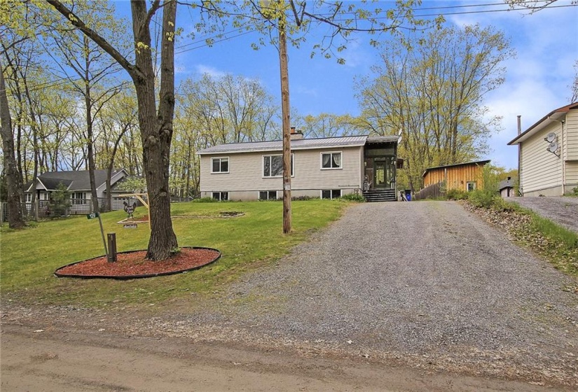 Nicely set back high on a hill from the road, with a double laneway for convenience and space!