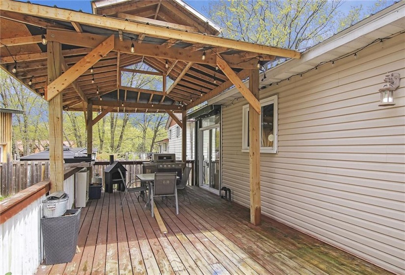 Walk out to your deck and gazebo from the patio door off the dining room for BBQ's and more