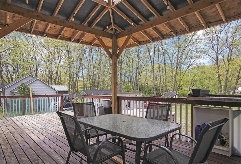 Walk out to your deck and gazebo from the patio door off the dining room for BBQ's and more